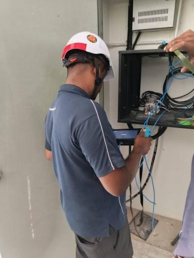 Technician installing CCTV equipment