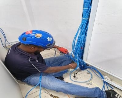 Technician terminating UTP cable